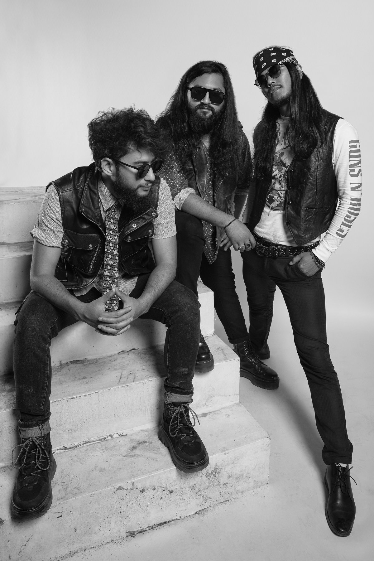 The Elements — Ishan, Raunaq, and Dipesh, black and white